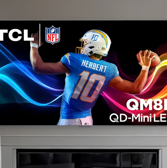 Samsung's S90F 4K TV on top of a stand.