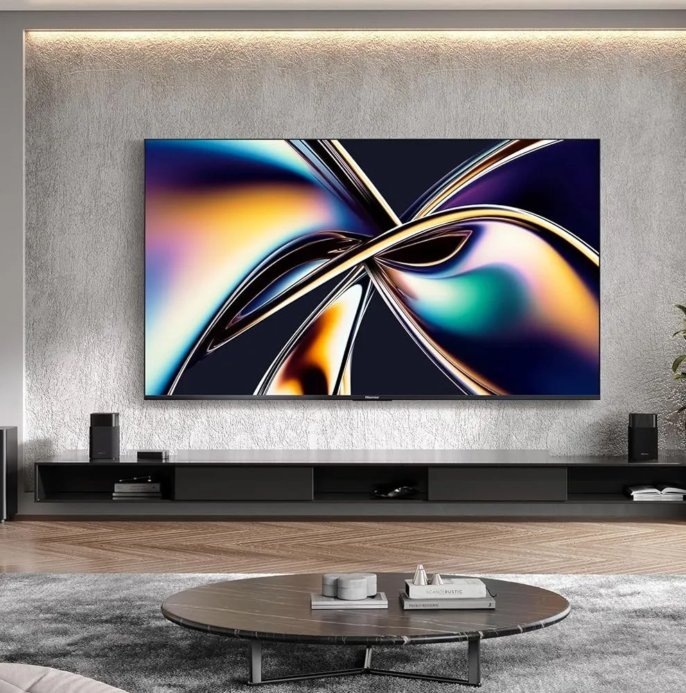 Sony’s Bravia 8 II mounted onto a wall on top of a media center.