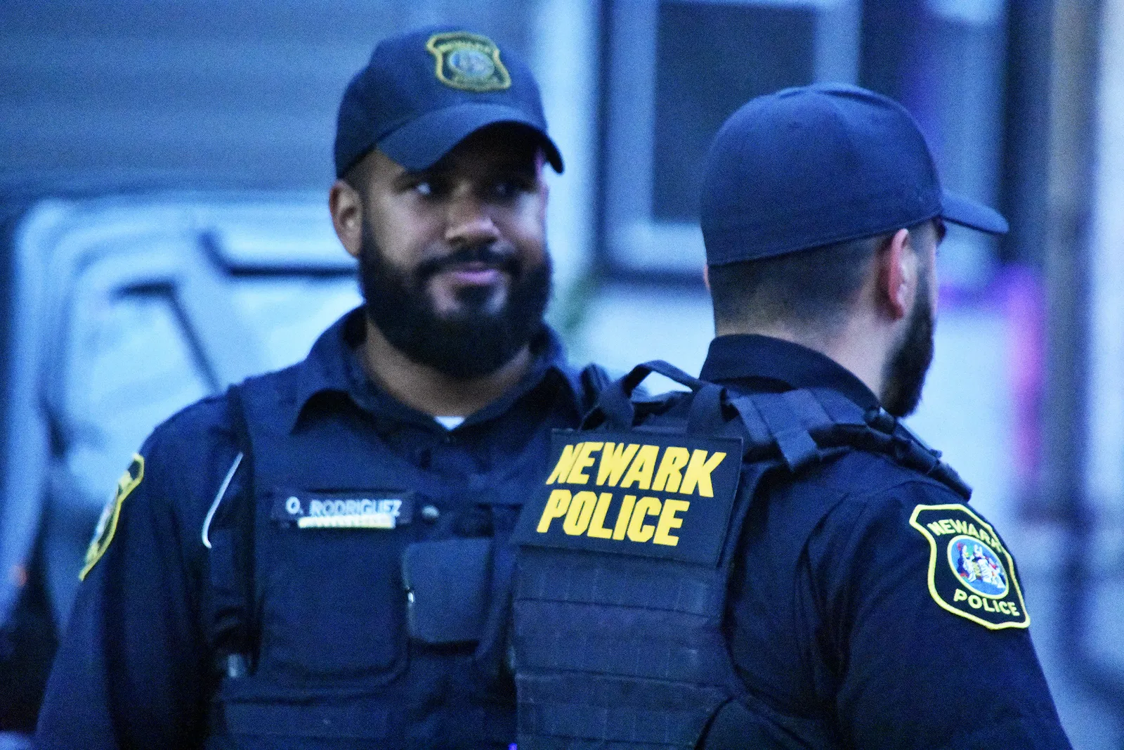 Two Newark Police officers standing outside