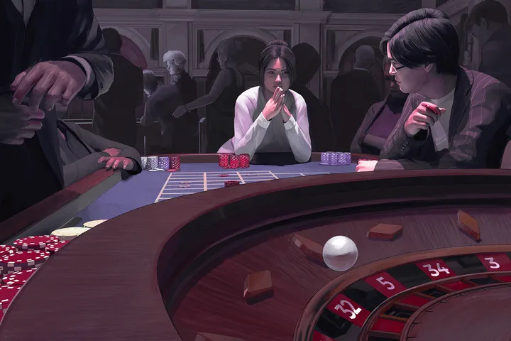 Two people sitting at a roulette table at a busy casino.