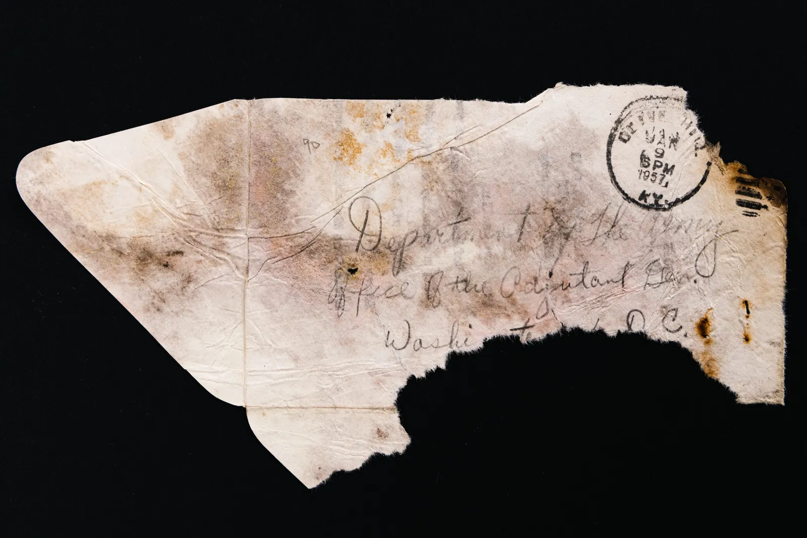 A firedamaged document mostly intact but with brittle charred edges on the right side.
