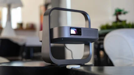 The XGIMI Elfin Flip 4K projector is shown in the folded position