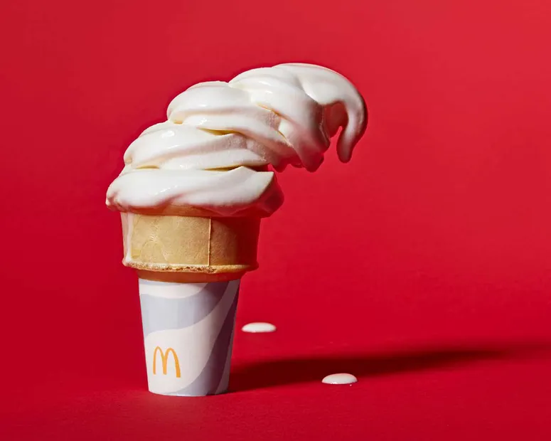 Fallen ice cream cone that has began to melt