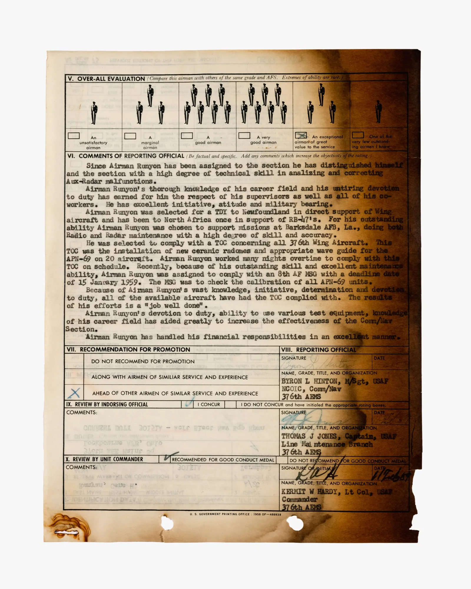 Image scan of a salvaged document and envelope with fire damage.