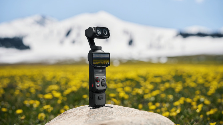 A gimbal camera on a field of flowers.
